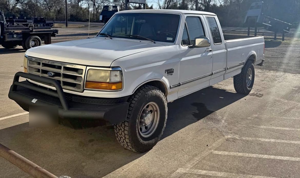 White Ford F-250 service truck